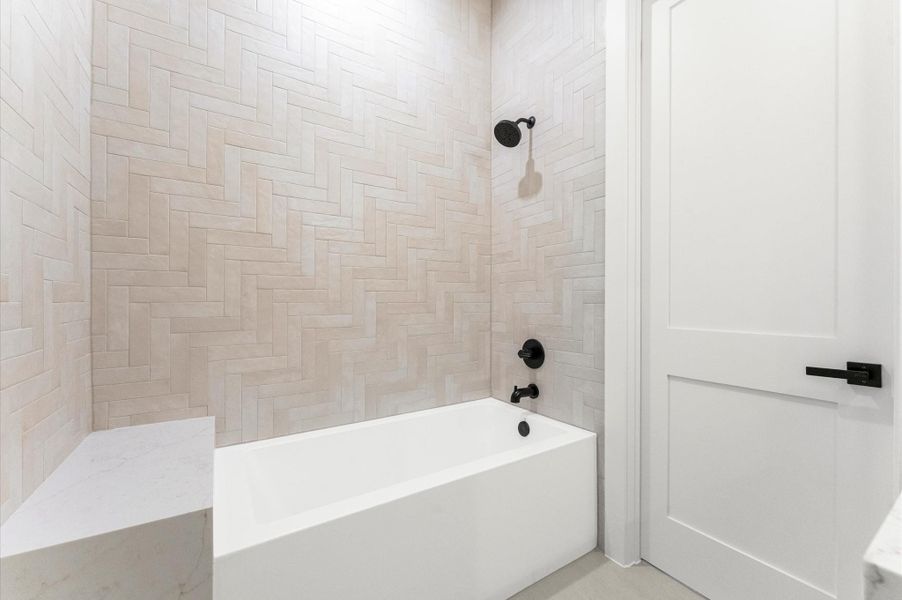 Bath 2 has custom shaker cabinets, quartz countertops and an alcove tub/shower combo. Bath 2 has custom shaker cabinets, quartz countertops and an alcove tub/shower combo.