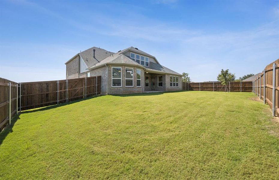 Spacious, fenced-in backyard Spacious, fenced-in backyard