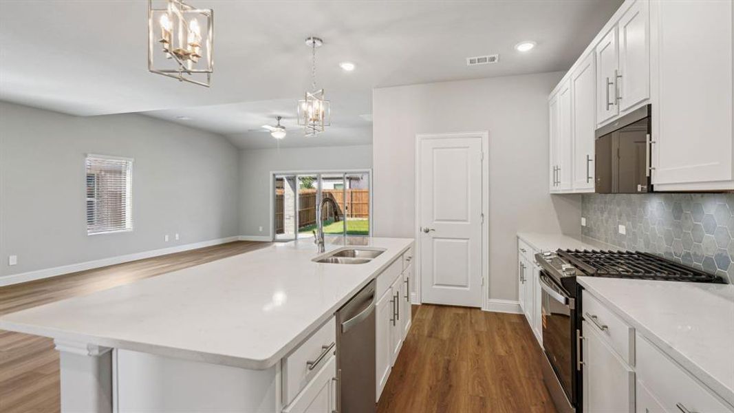 Photo is not of the actual home, but is an inspirational photo of builder’s model home and may depict options, furnishings, and/or decorator features that are not included.