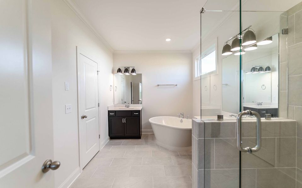 Furnished interior view inside a new home in Aden Woods, Fairview (Image 10).