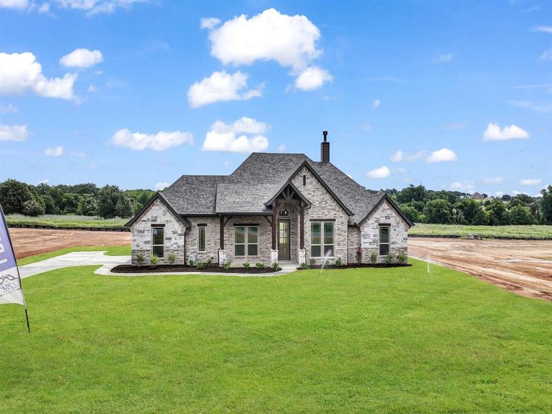 Front exterior of a new home in , Azle, TX, highlighting curb appeal (Image 20). Front exterior of a new home in , Azle, TX, highlighting curb appeal (Image 20).