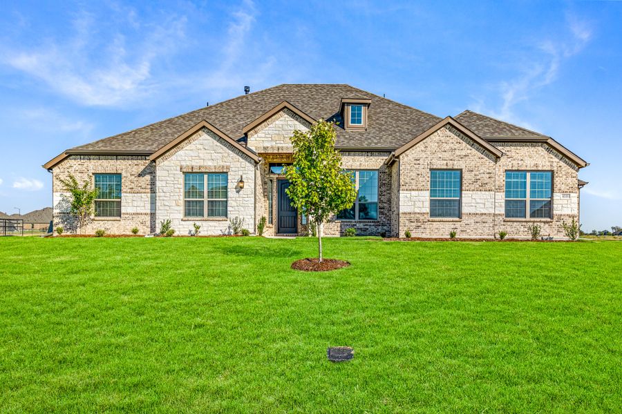 Front exterior of a new home in Creekview Farms, Greenville, TX, highlighting curb appeal (Image 24). Front exterior of a new home in Creekview Farms, Greenville, TX, highlighting curb appeal (Image 24).