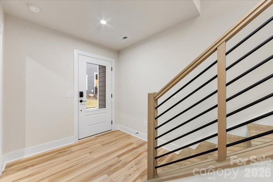 Grand Front Entry Through 8' Doorway.