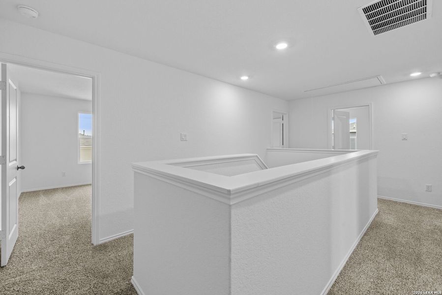 Furnished interior view inside a new home in Avenida, Converse (Image 6).