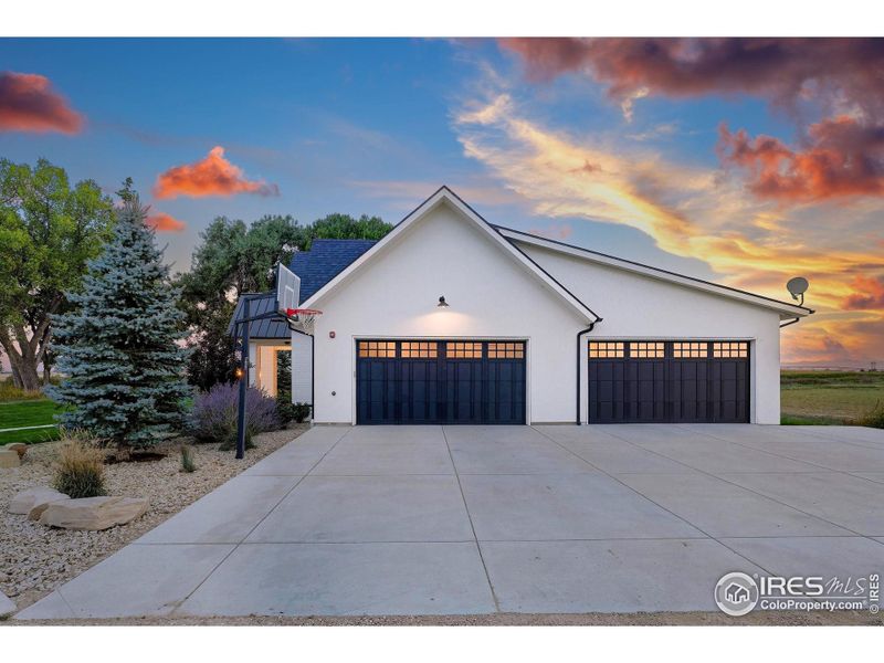Front exterior of a new home in , Longmont, CO, highlighting curb appeal (Image 21).