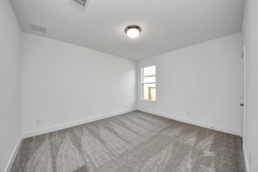 Spacious, unfurnished interior of a new home in The Canopies, Splendora (Image 10).