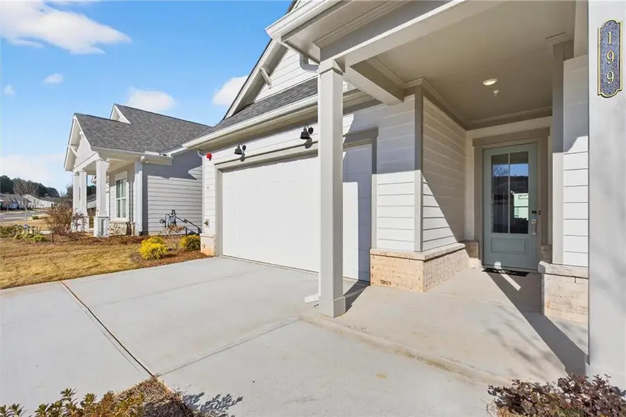 Exterior details and patio area of a home in The Reserve at Bells Ferry, Kennesaw (Image 3).
