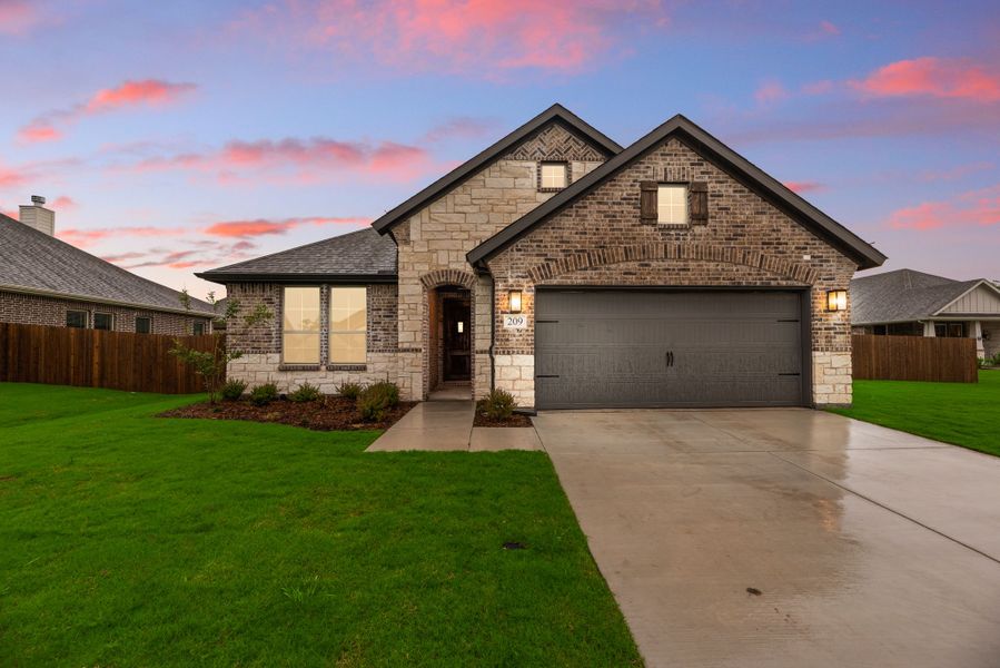 Front exterior of a new home in Aero Vista, Caddo Mills, TX, highlighting curb appeal (Image 27).