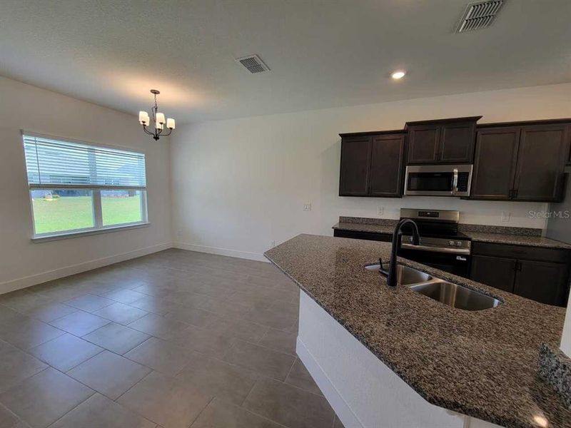 Furnished interior view inside a new home in Ocala Crossings South, Ocala (Image 13). Furnished interior view inside a new home in Ocala Crossings South, Ocala (Image 13).