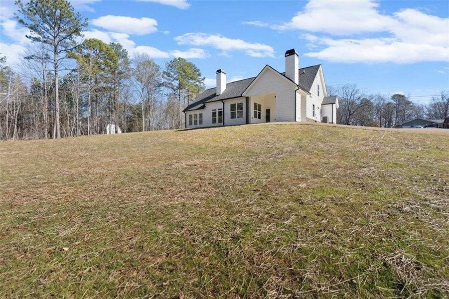 Exterior details and patio area of a home in , Waleska (Image 3).