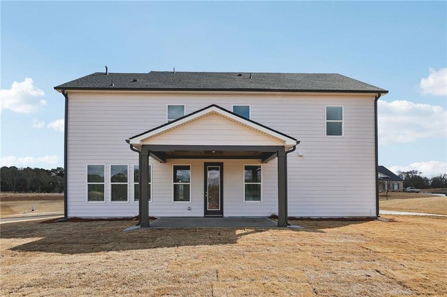 Exterior details and patio area of a home in River Pointe, Monroe (Image 26).