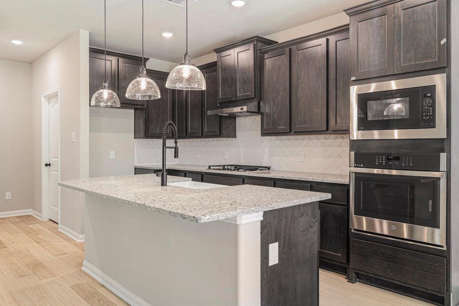 Furnished interior view inside a new home in Deer Pines, Conroe (Image 7).