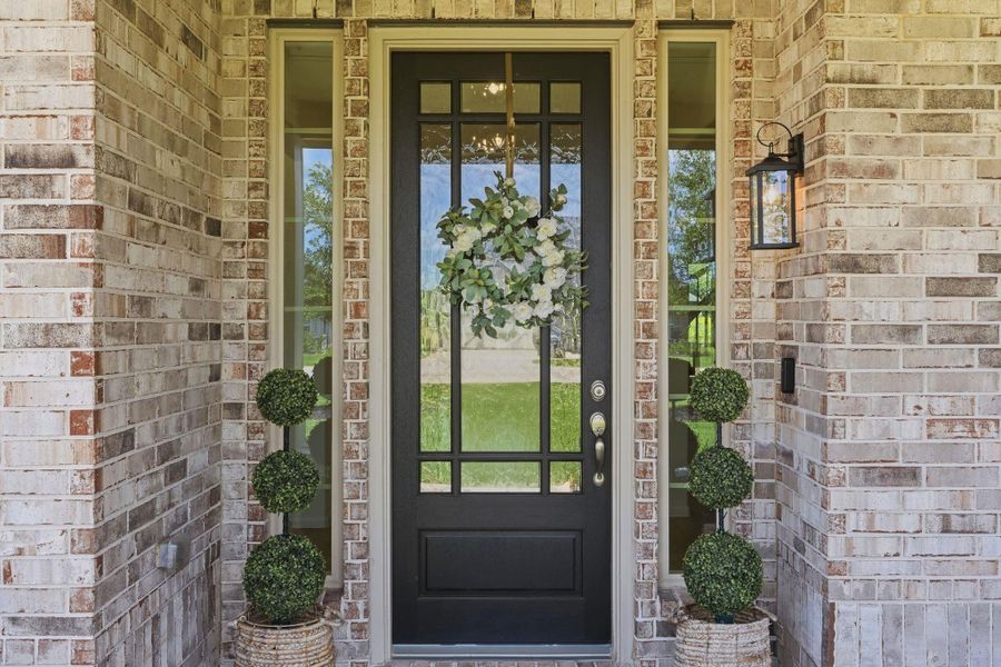Exterior details and patio area of a home in Waterstone on Lake Conroe, Montgomery (Image 24).