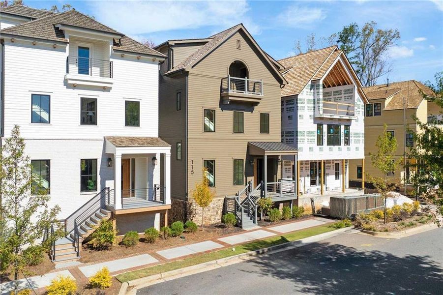 Front exterior of a new home in , Alpharetta, GA, highlighting curb appeal (Image 2).