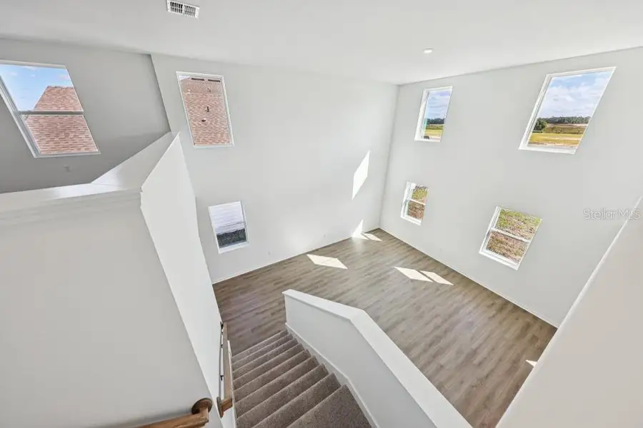 Furnished interior view inside a new home in Trailside, Mount Dora (Image 18). Furnished interior view inside a new home in Trailside, Mount Dora (Image 18).