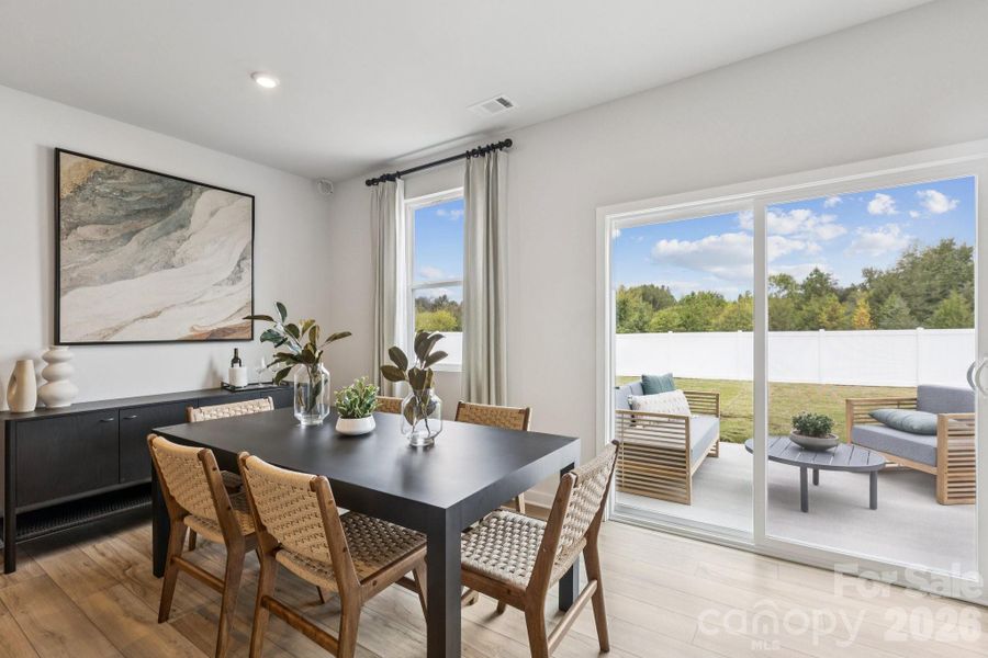 Furnished interior view inside a new home in Meadow Creek Village, Locust (Image 5).
