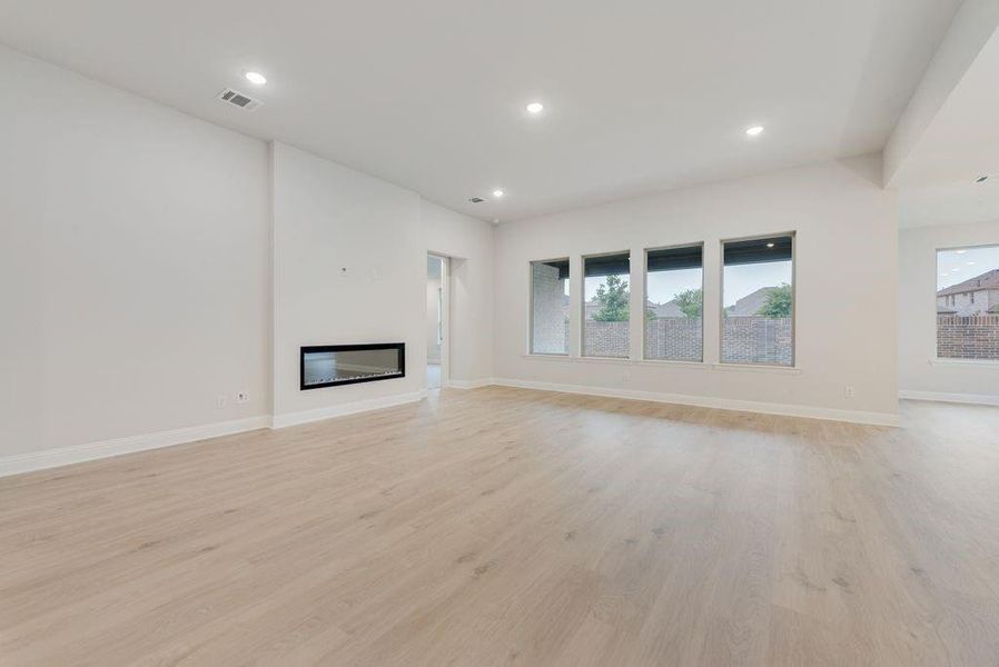 Spacious, unfurnished interior of a new home in Valencia On The Lake, Little Elm (Image 16).