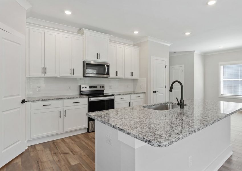 The kitchen has granite countertops