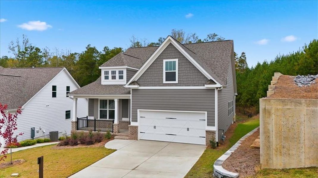 Front exterior of a new home in , Dallas, GA, highlighting curb appeal (Image 1).