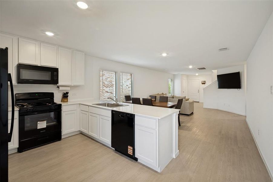Furnished interior view inside a new home in , Little Elm (Image 16).
