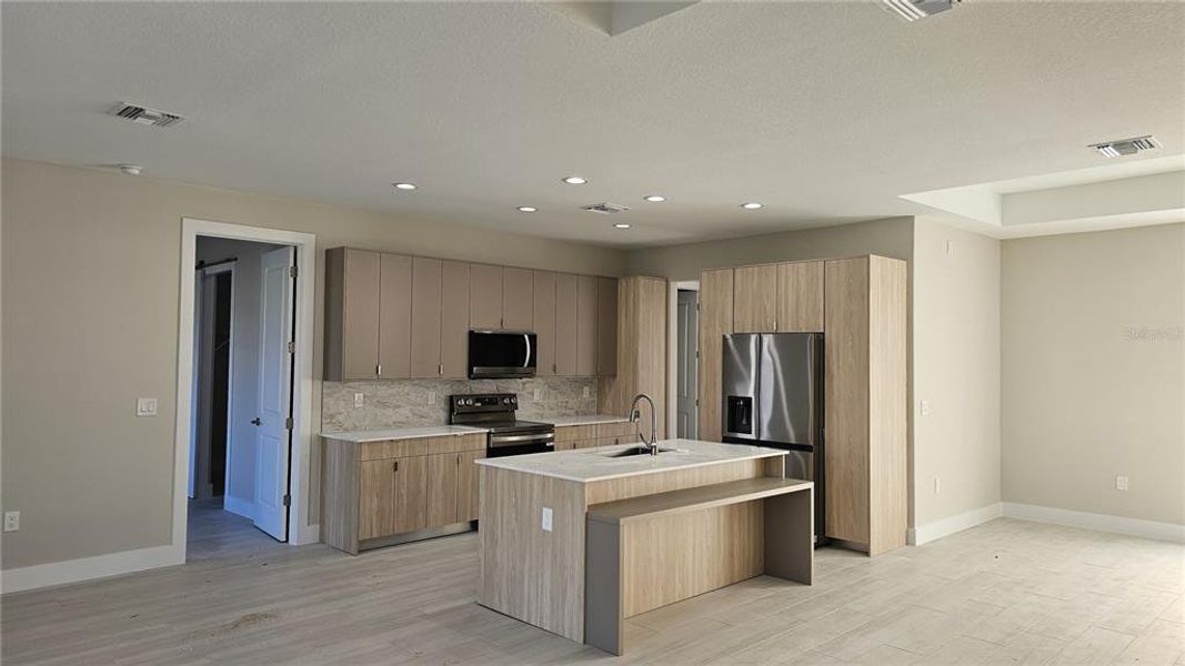 Furnished interior view inside a new home in , North Port (Image 6).