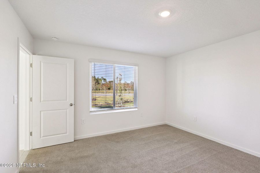 Spacious, unfurnished interior of a new home in Flagler Village - Signature Series, Palm Coast (Image 17).