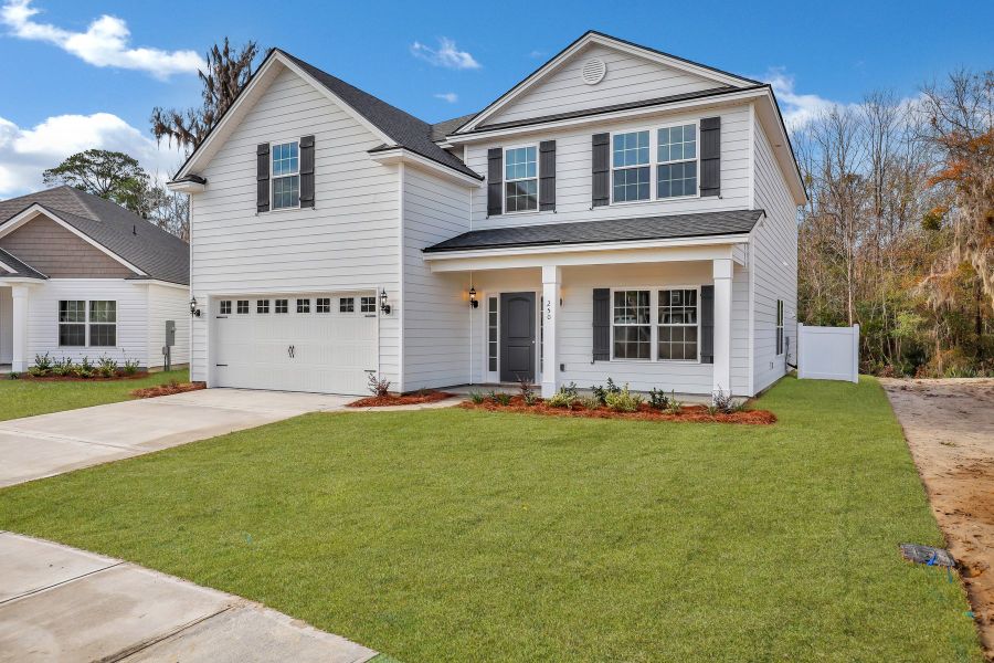 Front Elevation A with optional extended front porch of Nantucket plan built by Ernest Homes Front Elevation A with optional extended front porch of Nantucket plan built by Ernest Homes