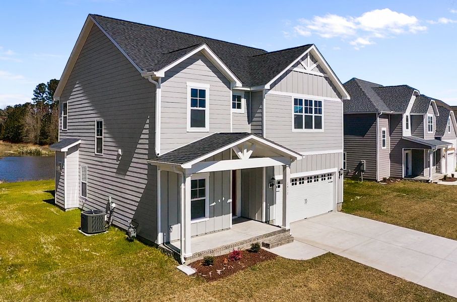 Representative exterior photo of a completed home built from the Turner by Bill Clark Homes in Davenport Farms, Winterville, NC (Image 23). Representative exterior photo of a completed home built from the Turner by Bill Clark Homes in Davenport Farms, Winterville, NC (Image 23).
