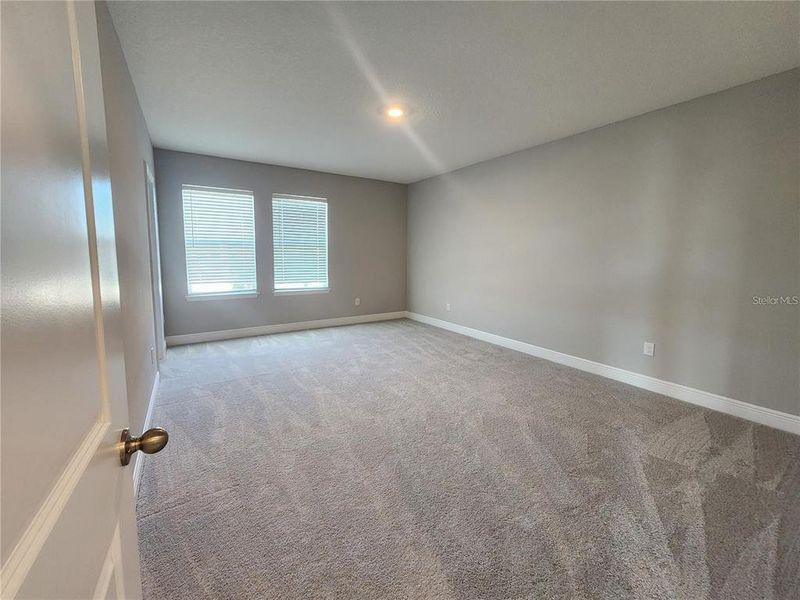 Spacious, unfurnished interior of a new home in Woodcreek, Wesley Chapel (Image 20).