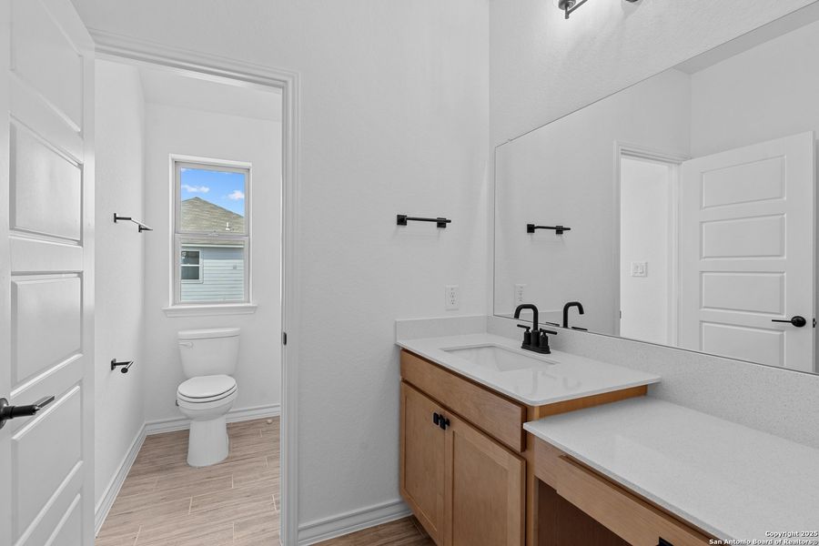 Furnished interior view inside a new home in Lily Springs, Seguin (Image 9).