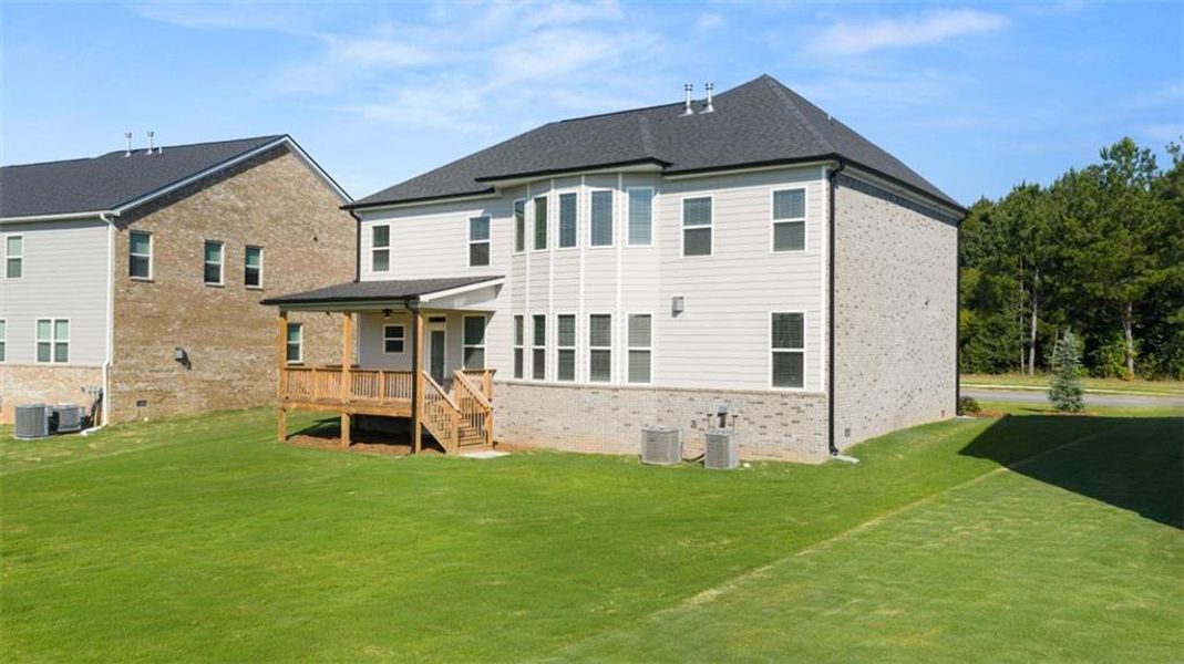 Front exterior of a new home in Westland, Bogart, GA, highlighting curb appeal (Image 24). Front exterior of a new home in Westland, Bogart, GA, highlighting curb appeal (Image 24).