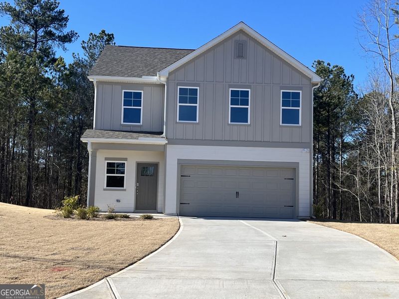 Front exterior of a new home in High Shoals, Dallas, GA, highlighting curb appeal (Image 2).