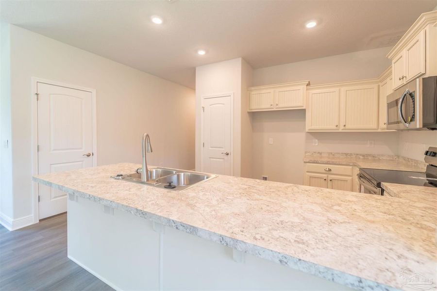 Representative furnished interior of a home built from the 1766 by Adams Homes in East Bay, Panama City (Image 7). Representative furnished interior of a home built from the 1766 by Adams Homes in East Bay, Panama City (Image 7).