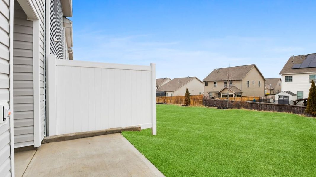 Exterior details and patio area of a home in Covington Village, Greer (Image 22).