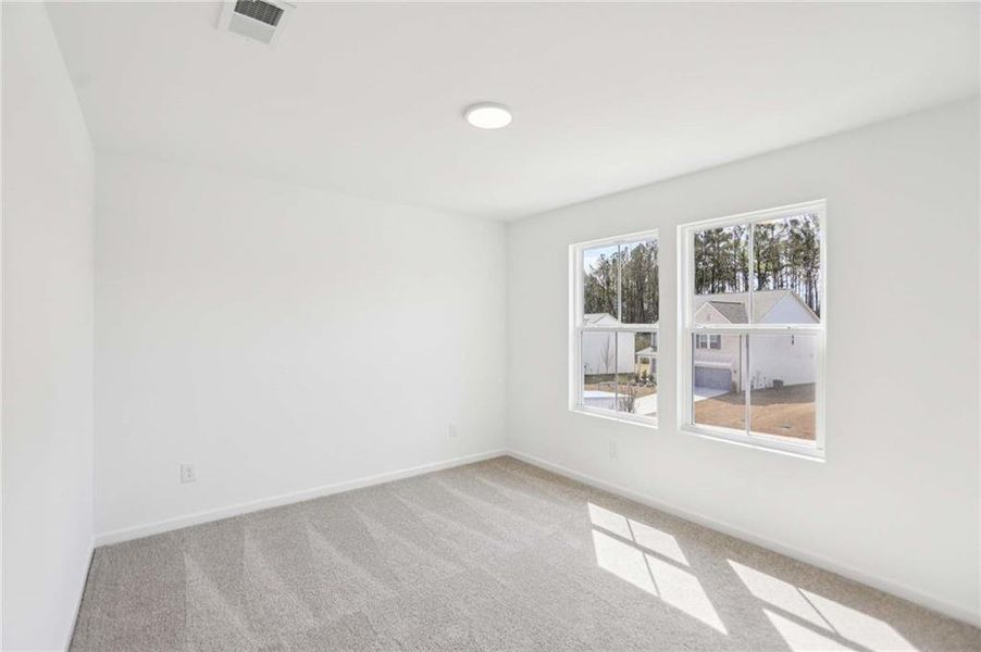 Spacious, unfurnished interior of a new home in The Pointe at Heron Bay, Locust Grove (Image 25).