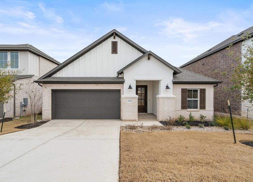 Front exterior of a new home in Park Collection at Lariat, Liberty Hill, TX, highlighting curb appeal (Image 22). Front exterior of a new home in Park Collection at Lariat, Liberty Hill, TX, highlighting curb appeal (Image 22).