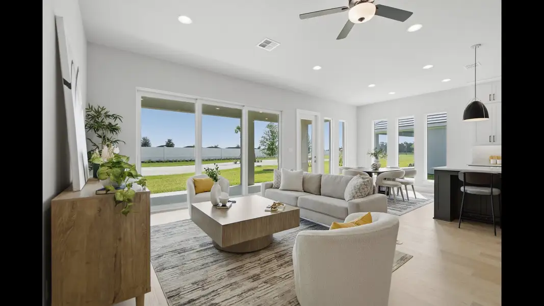 Representative furnished interior of a home built from the 2546F by Perry Homes in Sanctuary at Seaire, Parrish (Image 6).