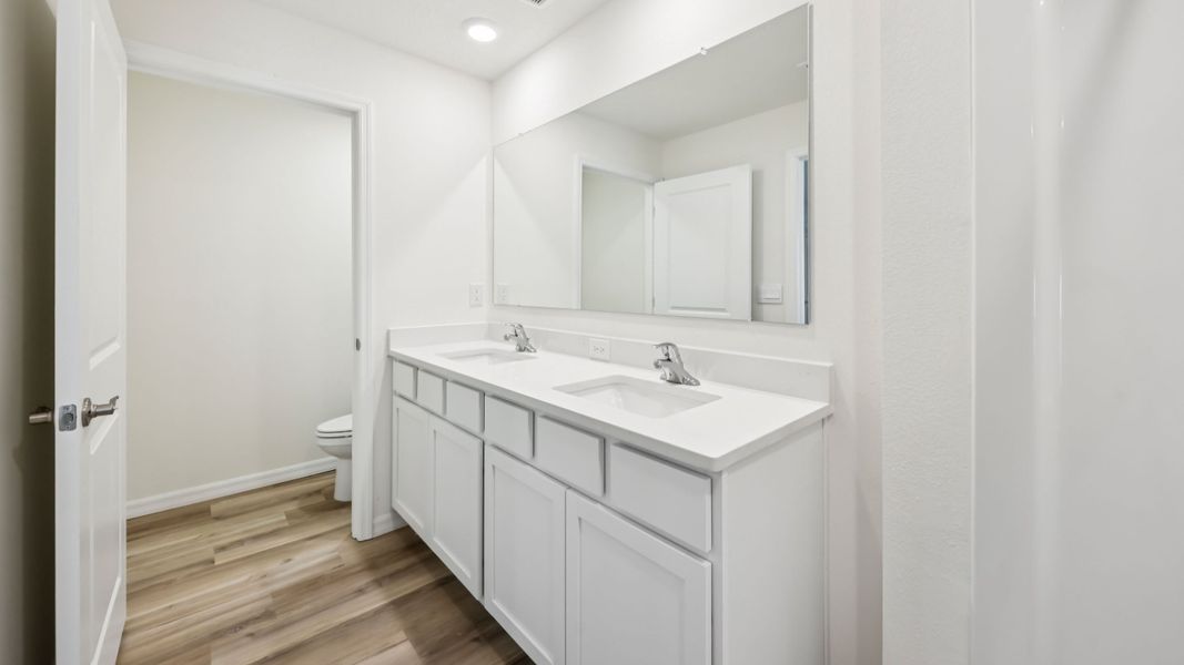 Representative furnished interior of a home built from the Harper by D.R. Horton in Sandal Key, Weeki Wachee (Image 15).
