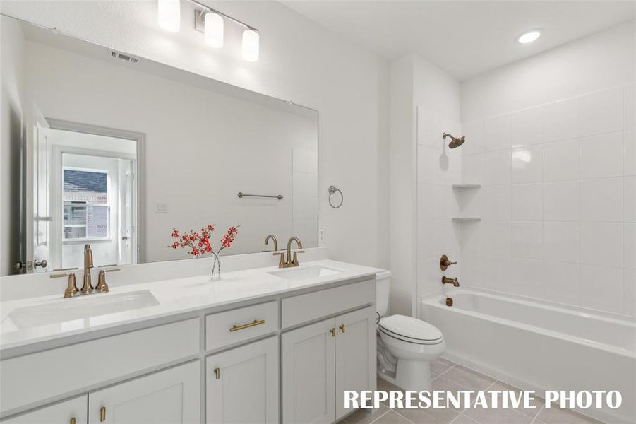 Friends and family will enjoy this thoughtfully designed guest bath offering space for two.  REPRESENTATIVE PHOTO