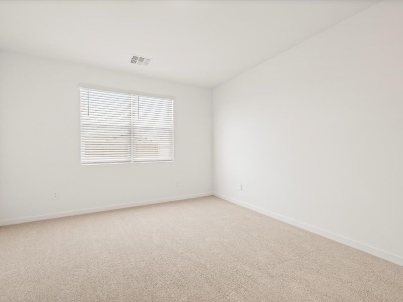 Spacious, unfurnished interior of a new home in Rancho Mirage Estate Series, Maricopa (Image 11).