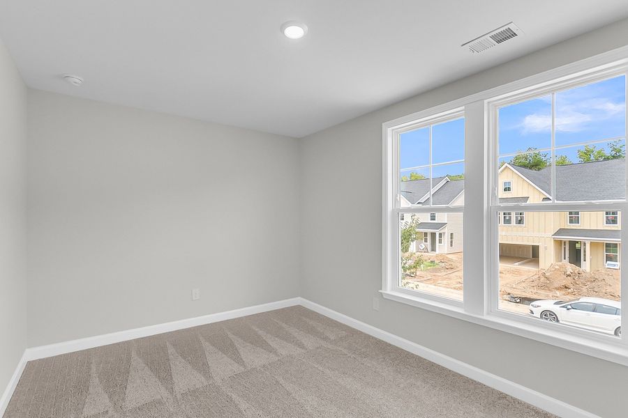 Spacious, unfurnished interior of a new home in Pineland Preserve, Summerville (Image 44).