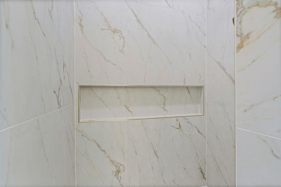 Bathroom view of a marble finish shower Bathroom view of a marble finish shower