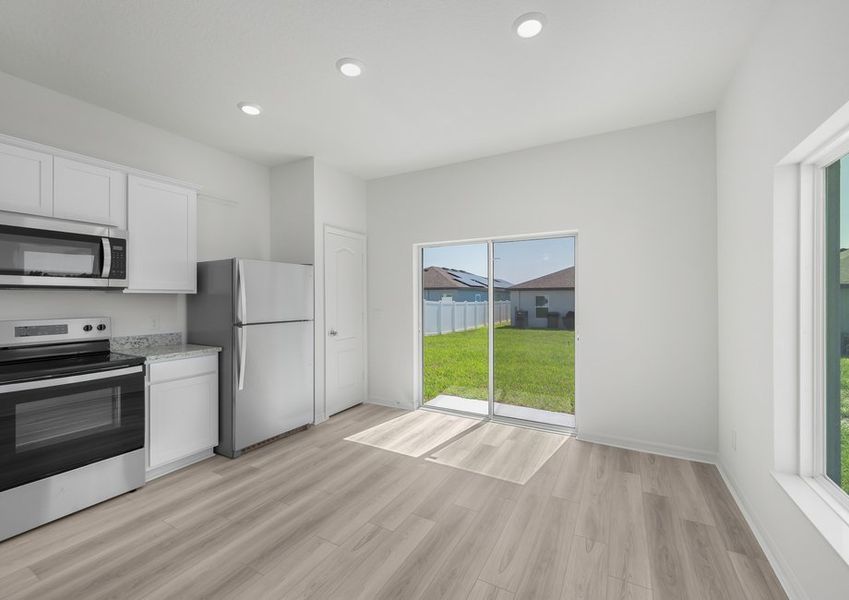 Sliding glass doors lead to the backyard Sliding glass doors lead to the backyard