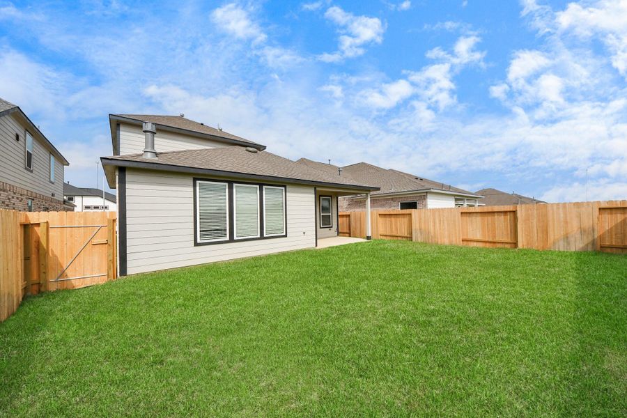 Explore the expansive backyard with its inviting covered patio—a perfect blend of space for the kids to play and adults to unwind. Ideal for creating your outdoor oasis, this backyard accommodates patio furniture, a BBQ pit, and endless possibilities for leisure and entertainment.