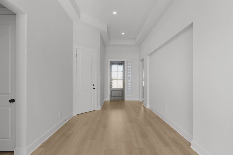 Representative unfurnished interior of a home built from the Barron by Chesmar Homes in Lariat, Liberty Hill (Image 22).