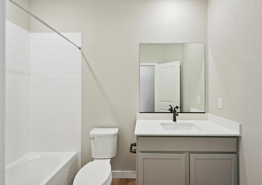 The secondary bathroom of the Arapaho has a shower-tub combo.