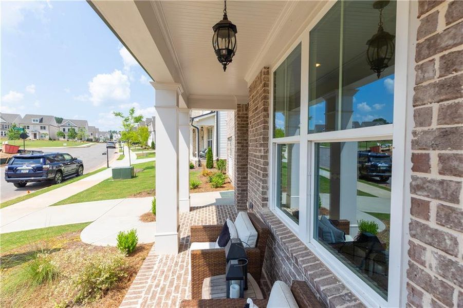 Exterior details and patio area of a home in Waterhaven Single Family, Cumming (Image 4).