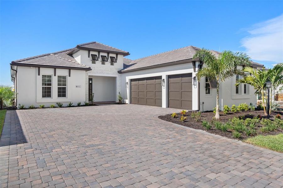 Front exterior of a new home in , Sarasota, FL, highlighting curb appeal (Image 30).