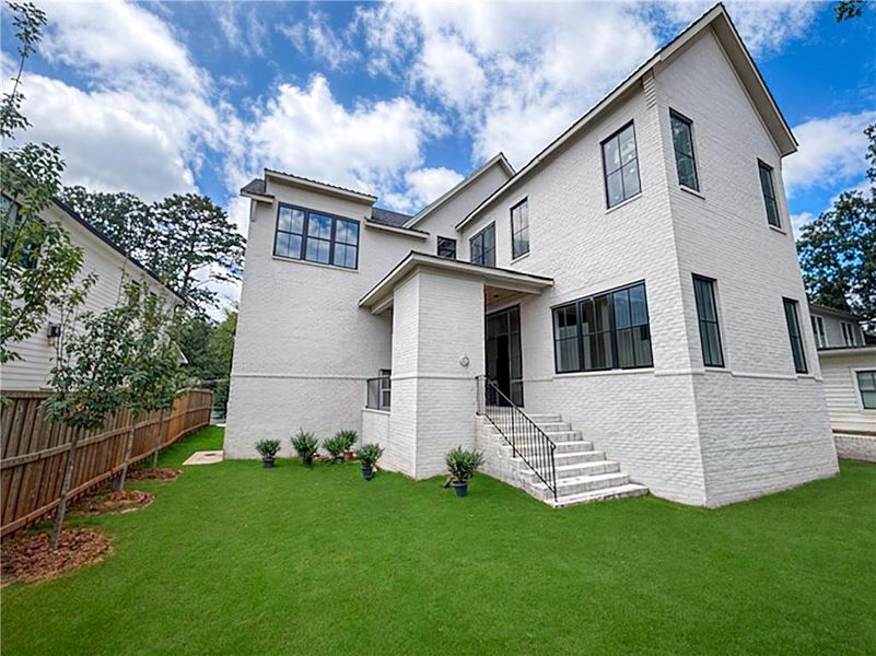 Front exterior of a new home in , Atlanta, GA, highlighting curb appeal (Image 1).
