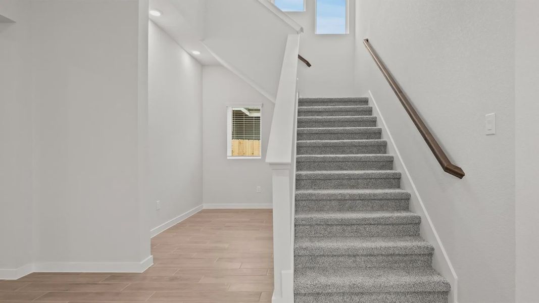 Representative unfurnished interior of a home built from the Dayton by Chesmar Homes in Lariat, Liberty Hill (Image 12).